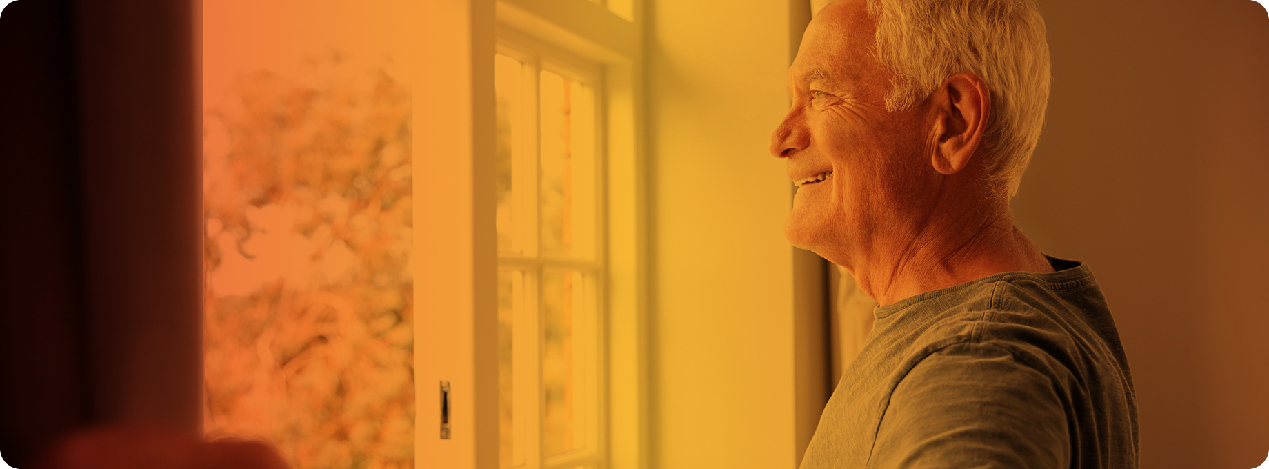 Man looking out a window